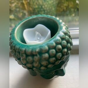 Buddha head serene green ceramic candle holder. New